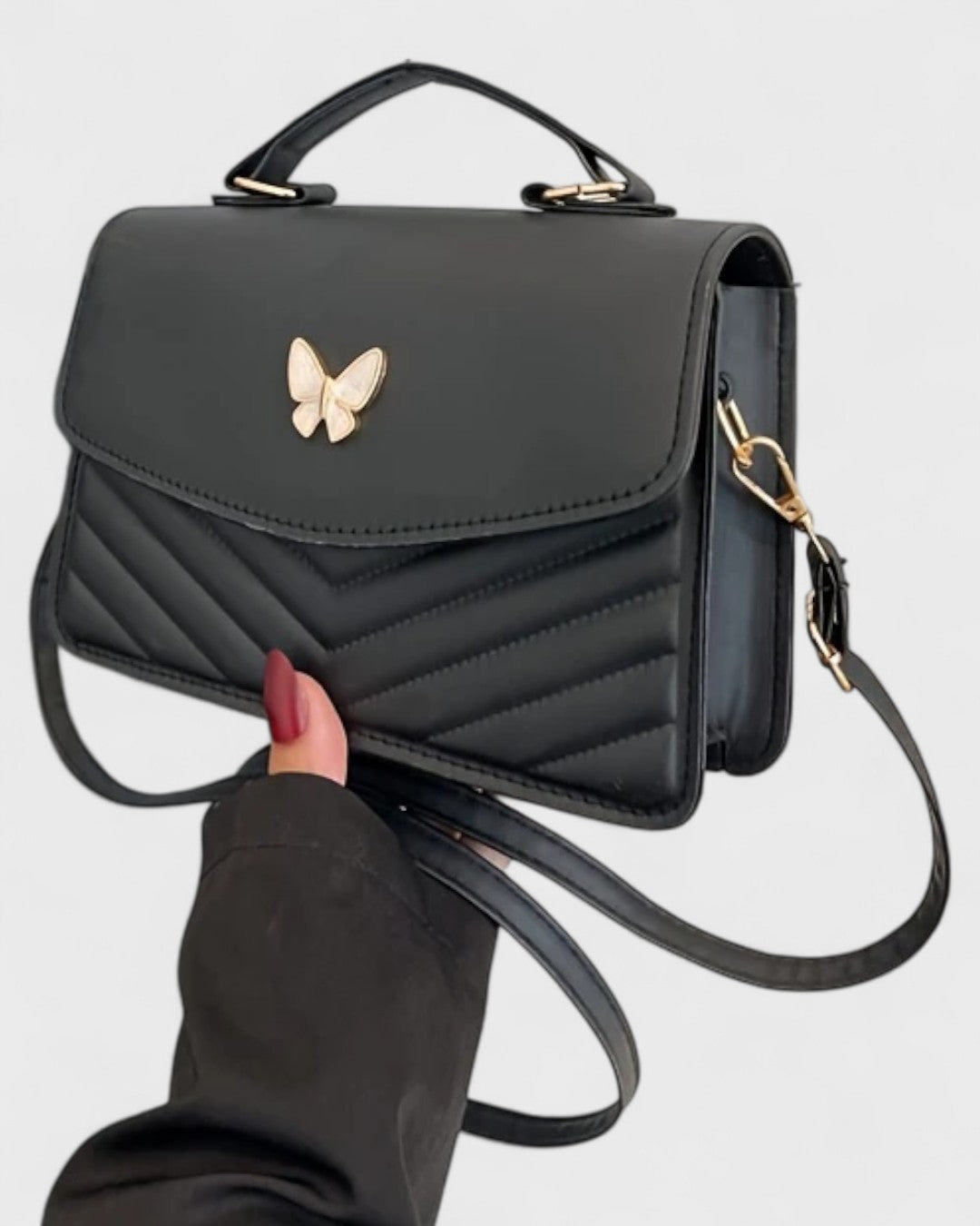 Sac à main papillon en simili cuir matelassé