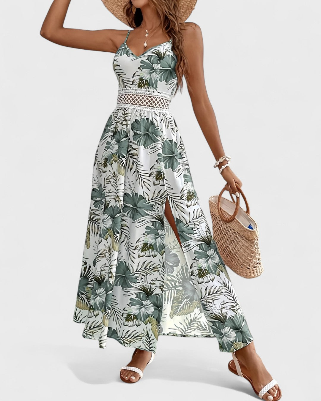 Robe longue fluide à fleurs tropicales et taille ajourée