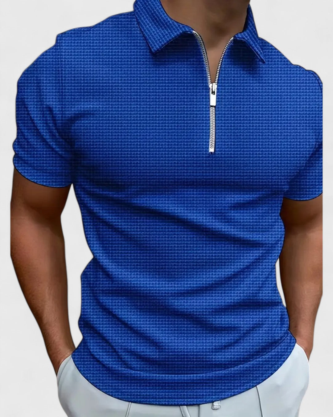 Polo zippé à col structuré