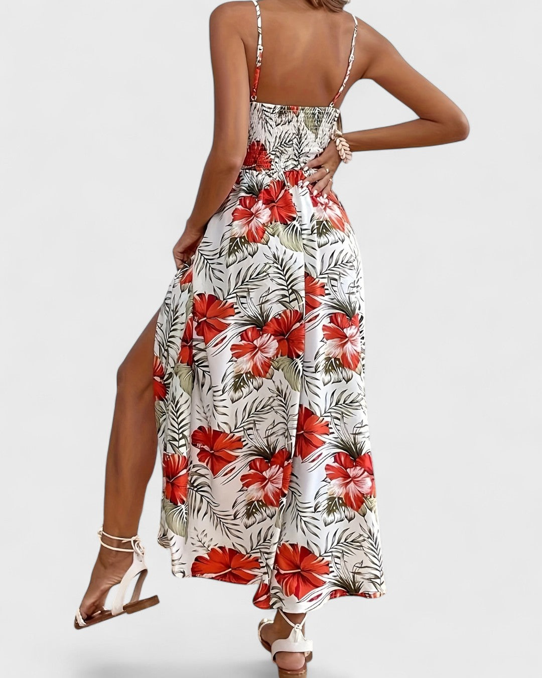 Robe longue fluide à fleurs tropicales et taille ajourée