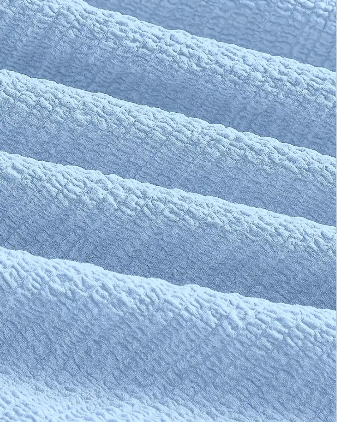 Cléa | Robe courte bleue à bretelles nouées et jupe à volants