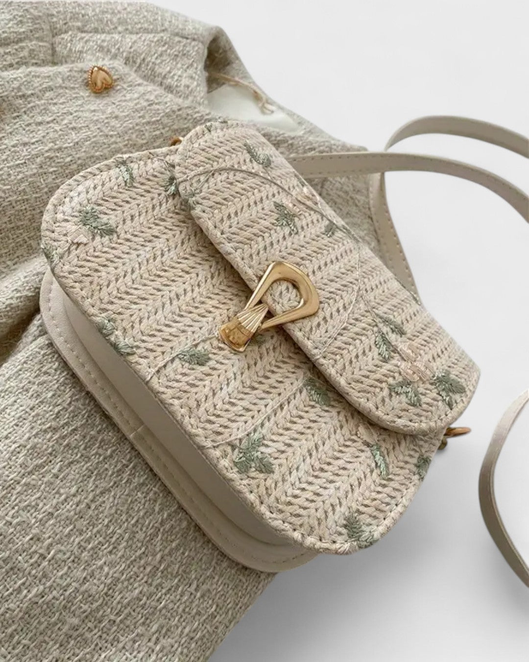 Sac bandoulière tissé à motif fleuri