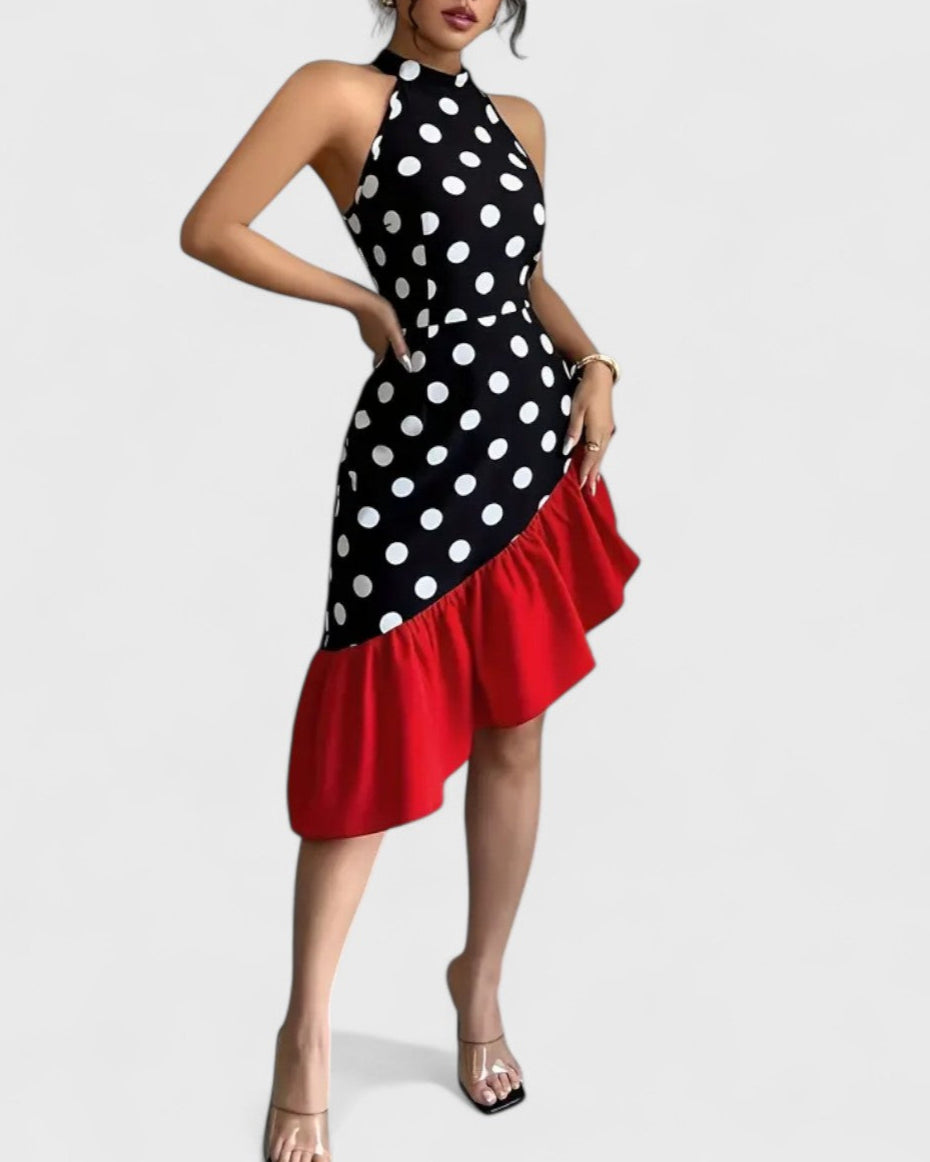Robe noire à pois blancs et volant rouge asymétrique