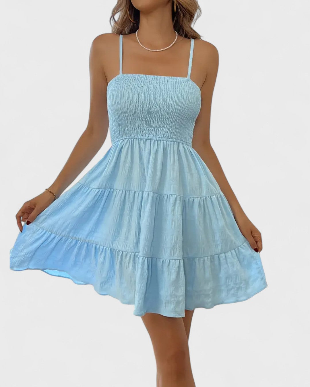 Robe d’été smockée à fines bretelles