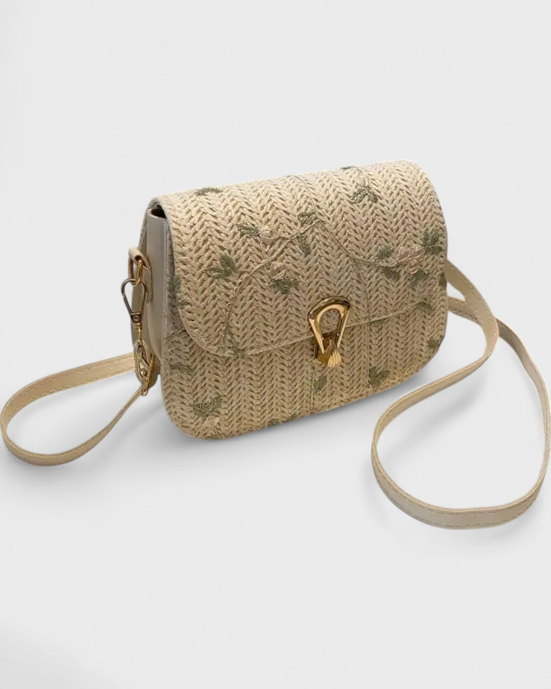 Sac bandoulière tissé à motif fleuri