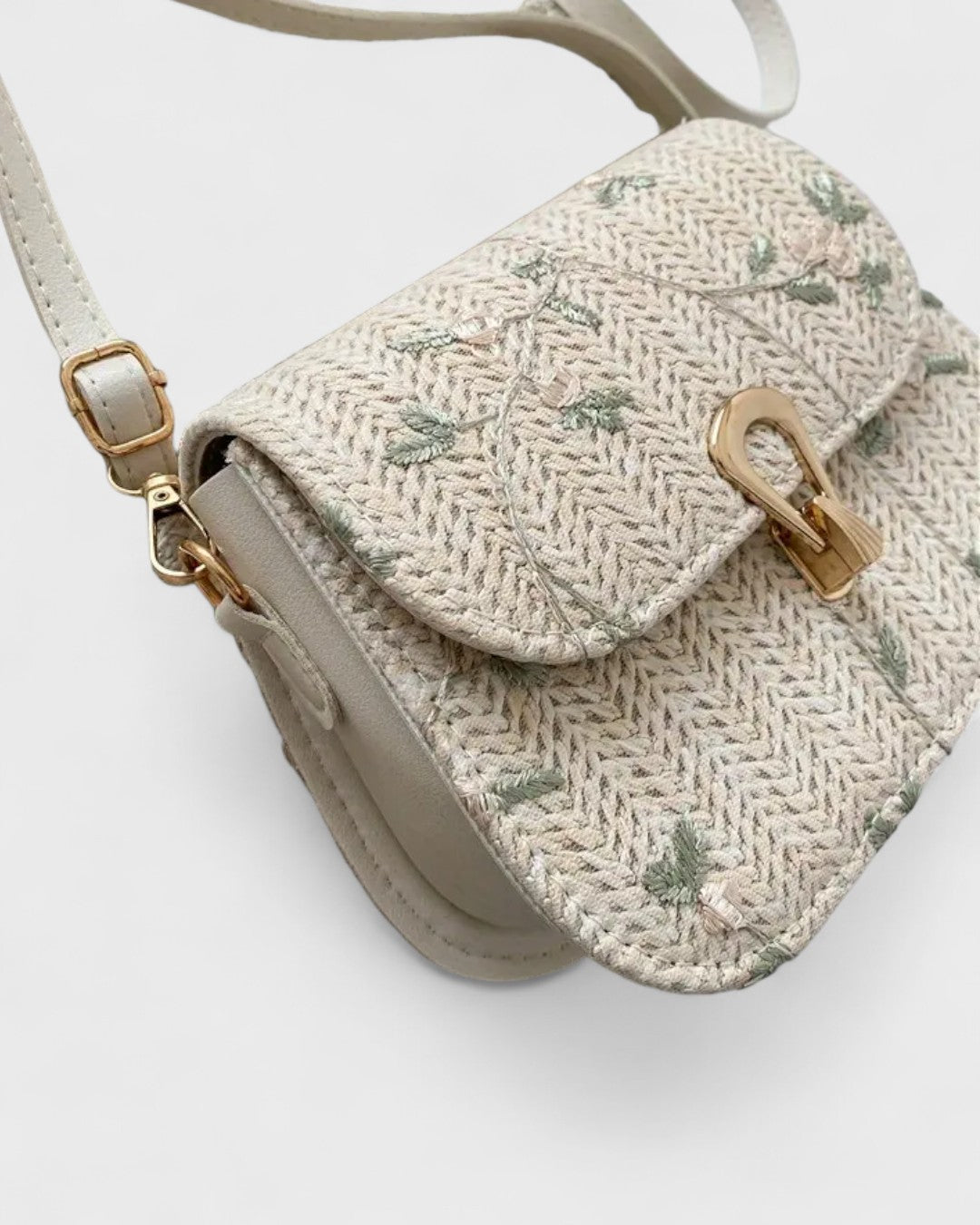 Sac bandoulière tissé à motif fleuri