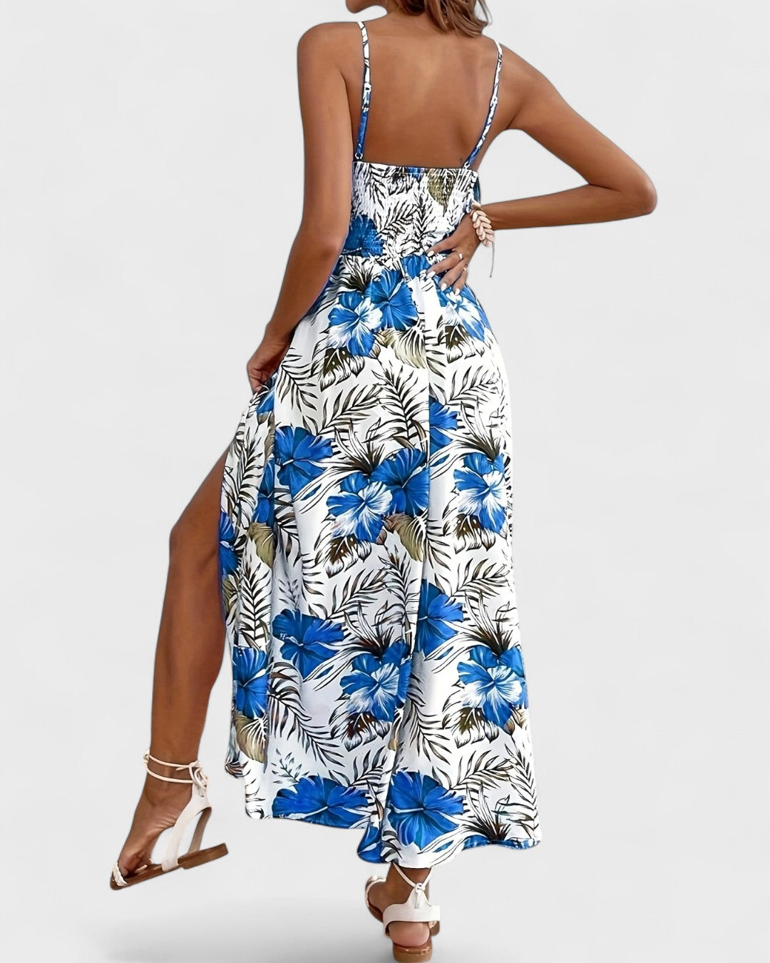 Robe longue fluide à fleurs tropicales et taille ajourée