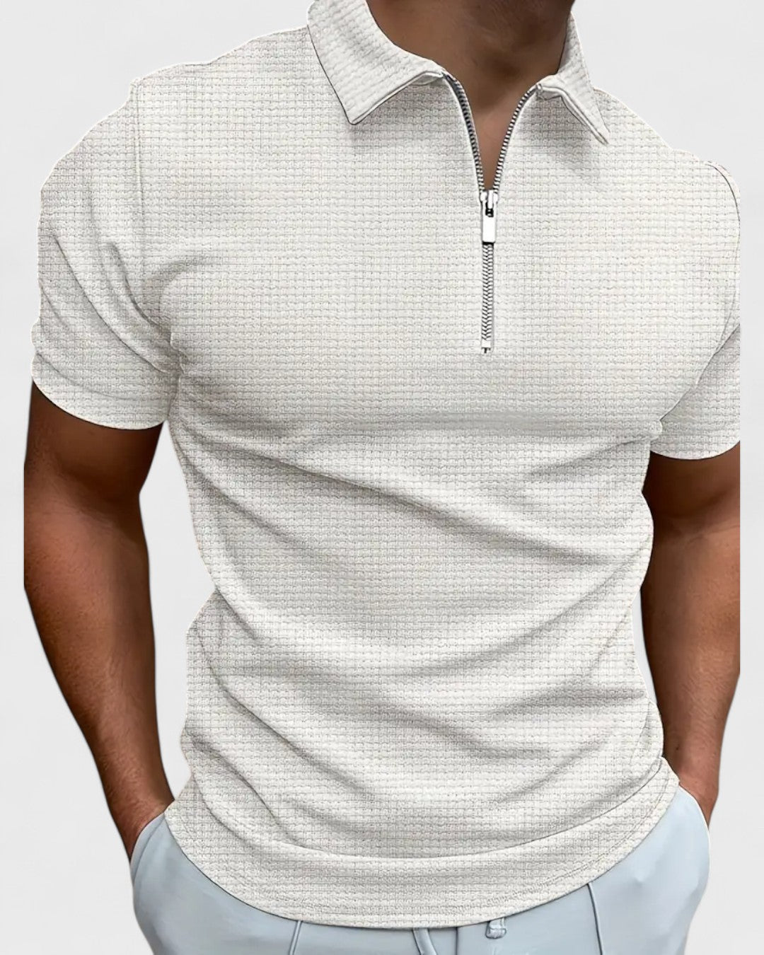 Polo zippé à col structuré