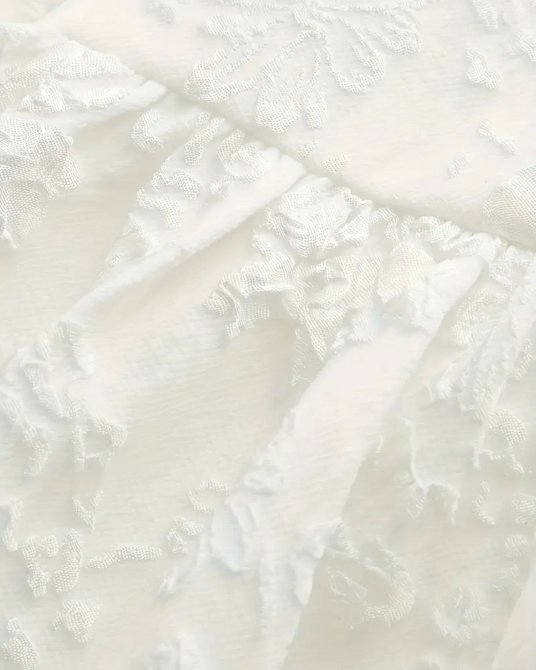 Robe bustier évasée brodée blanche