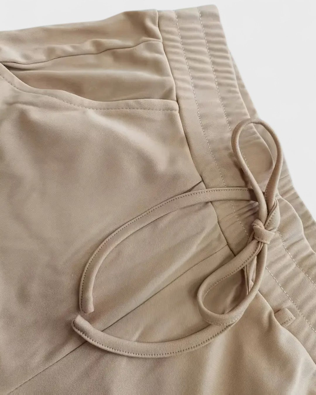 Ensemble deux-pièces zippé à anneaux métalliques