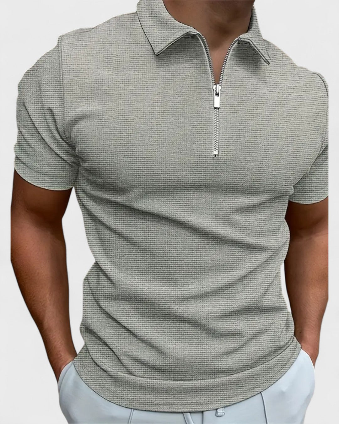 Polo zippé à col structuré