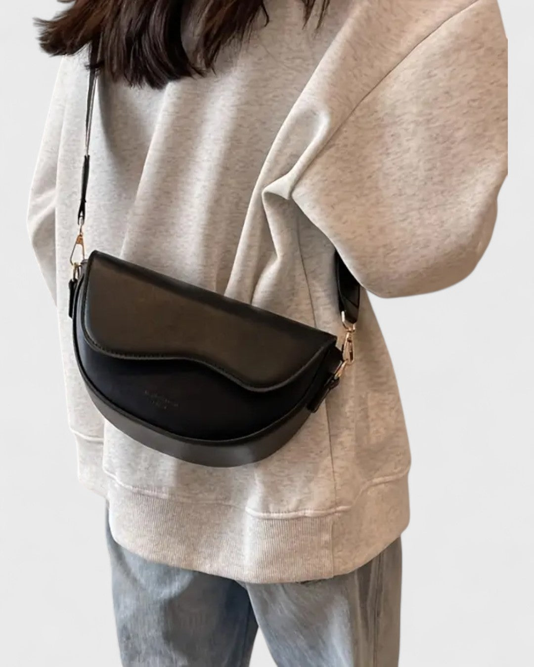 Céline | Sac bandoulière demi-lune au charme minimaliste
