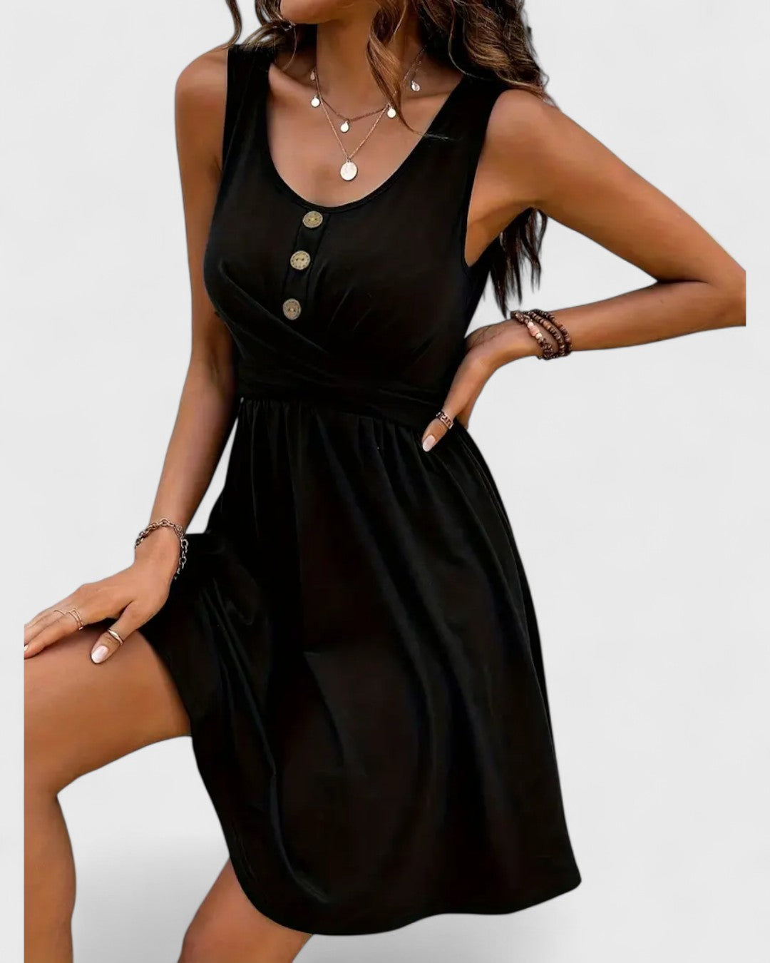 Robe sans manches noire à boutons et taille cintrée