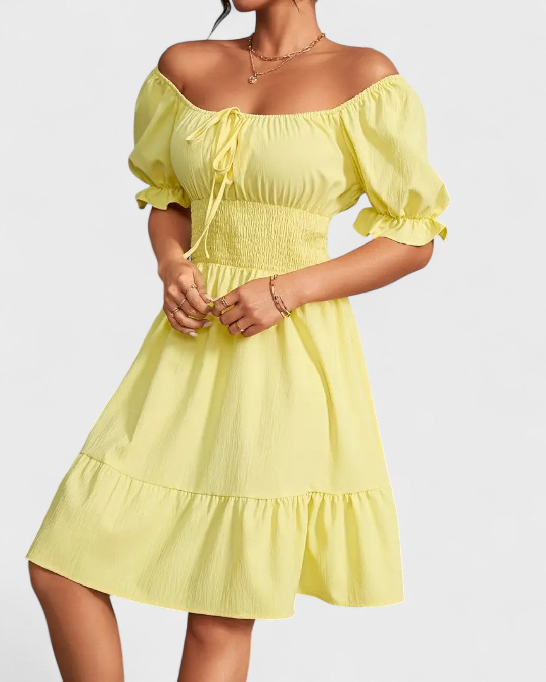 Robe d'été unie à manches bouffantes et ourlet volanté