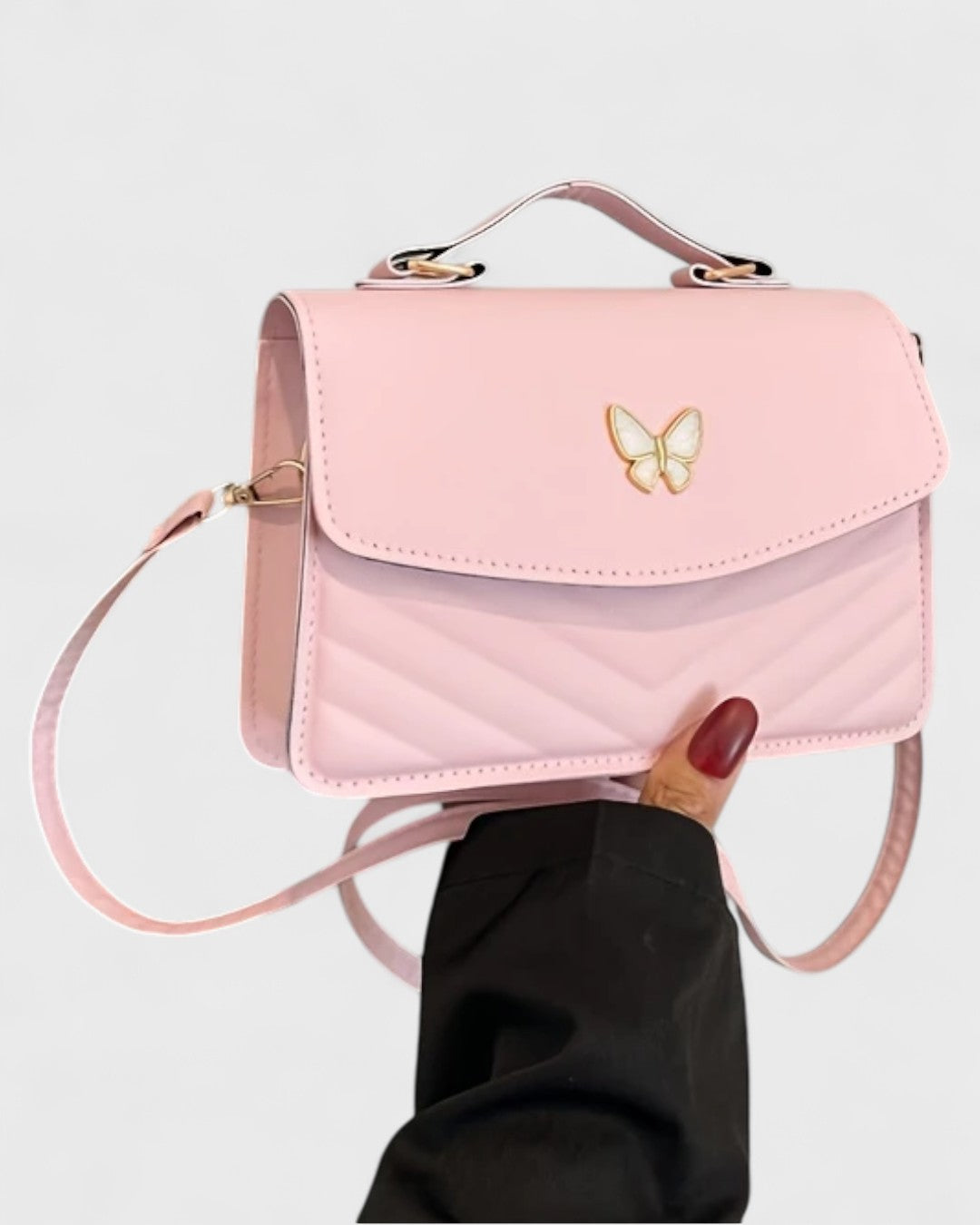 Sac à main papillon en simili cuir matelassé