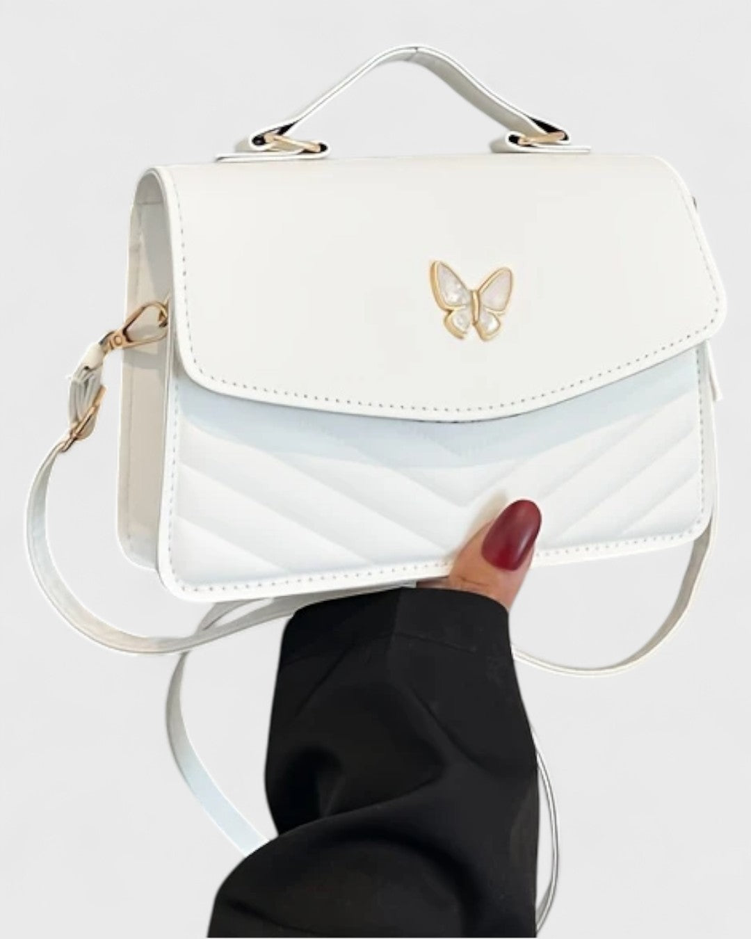 Sac à main papillon en simili cuir matelassé