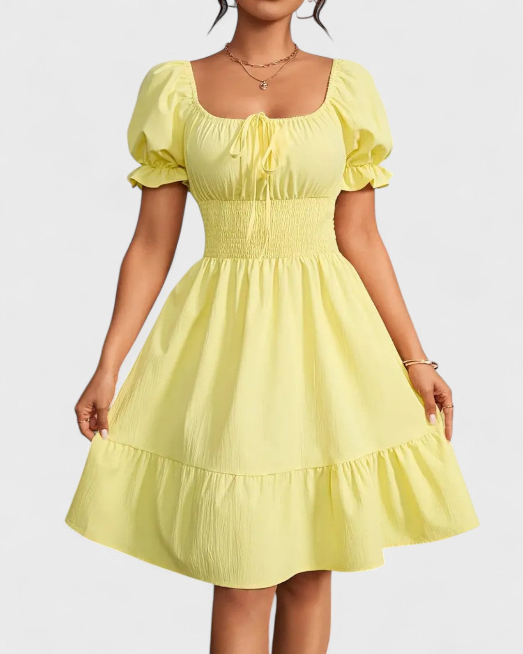 Robe d'été unie à manches bouffantes et ourlet volanté