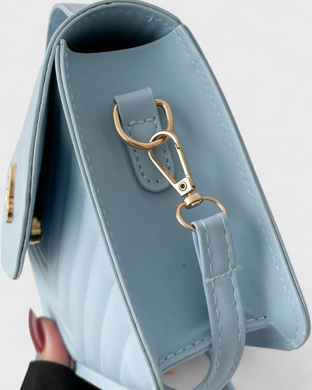Sac à main papillon en simili cuir matelassé