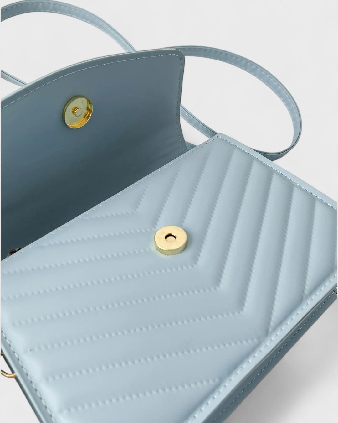 Sac à main papillon en simili cuir matelassé