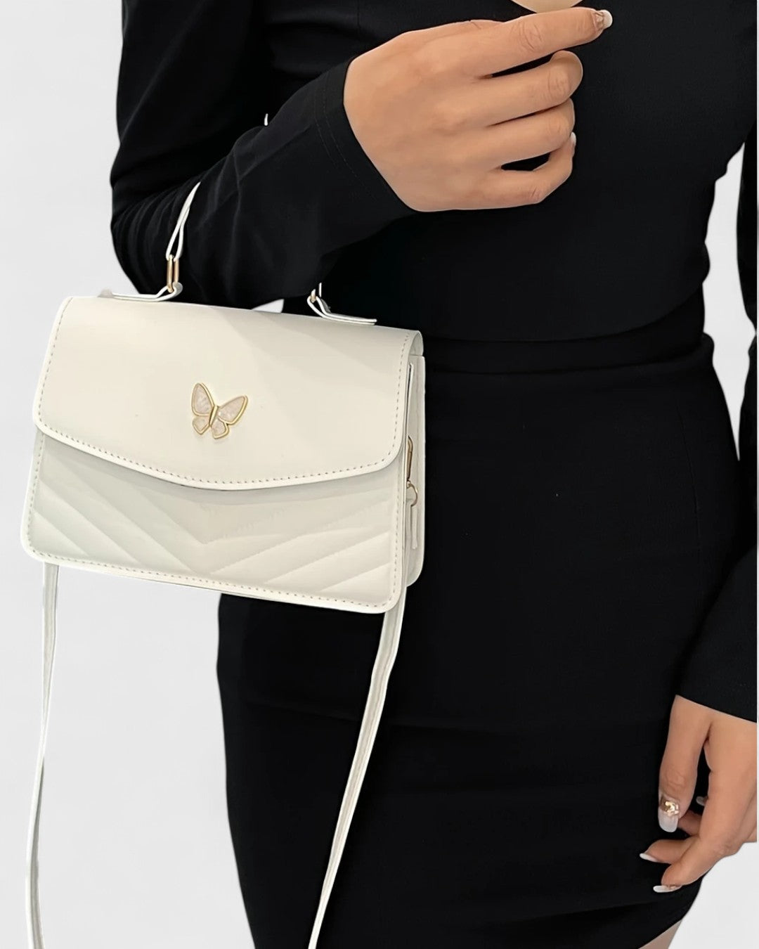 Sac à main papillon en simili cuir matelassé
