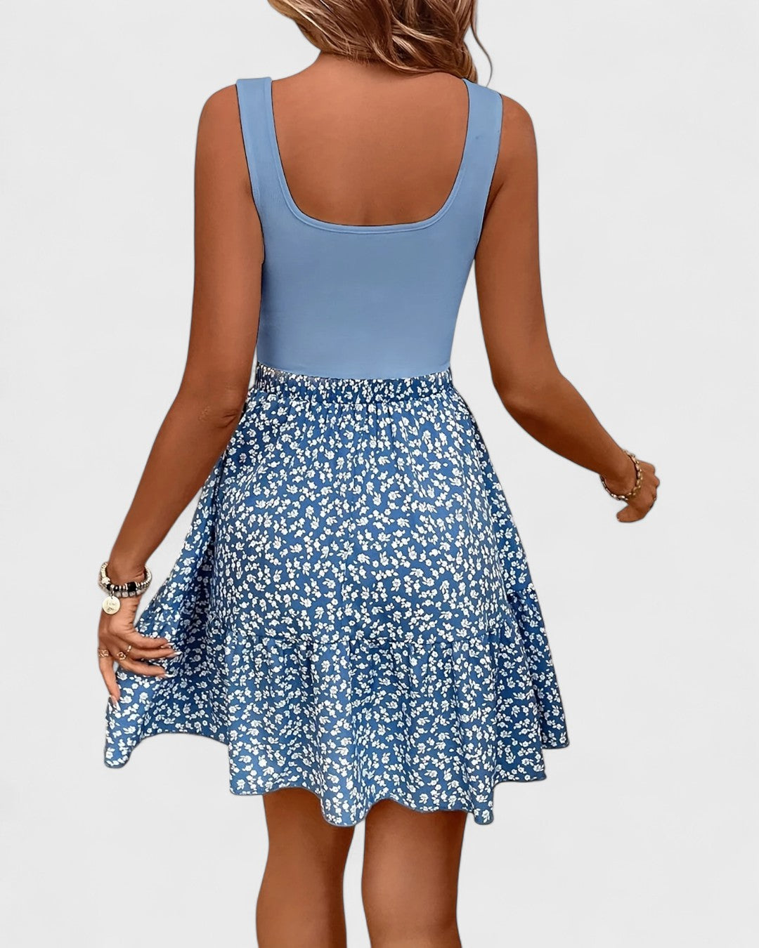 Robe évasée à bretelles et jupe fleurie