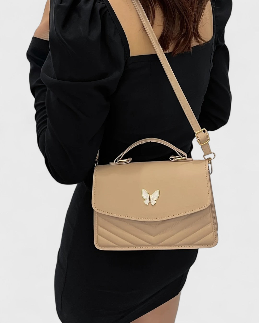 Sac à main papillon en simili cuir matelassé
