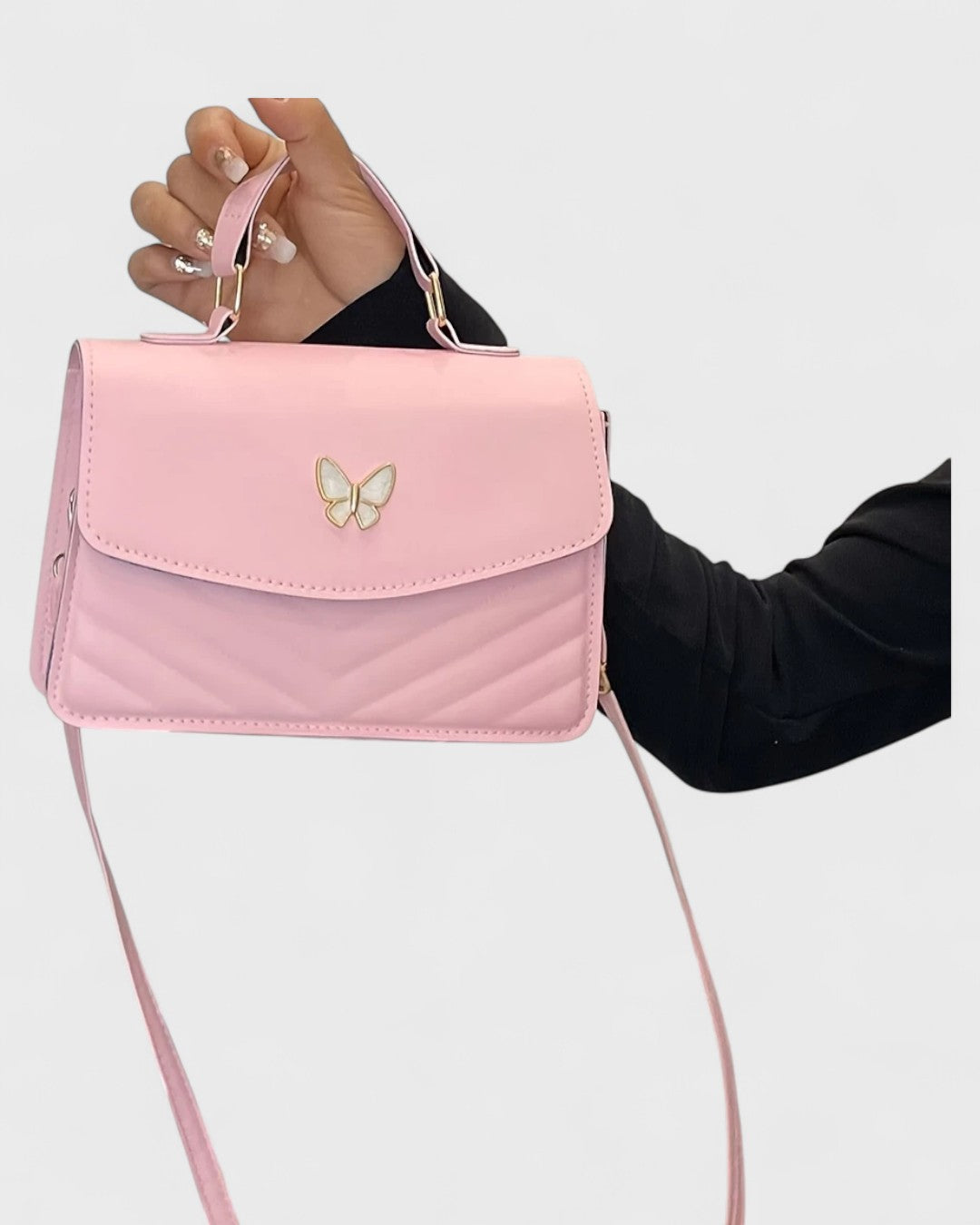 Sac à main papillon en simili cuir matelassé