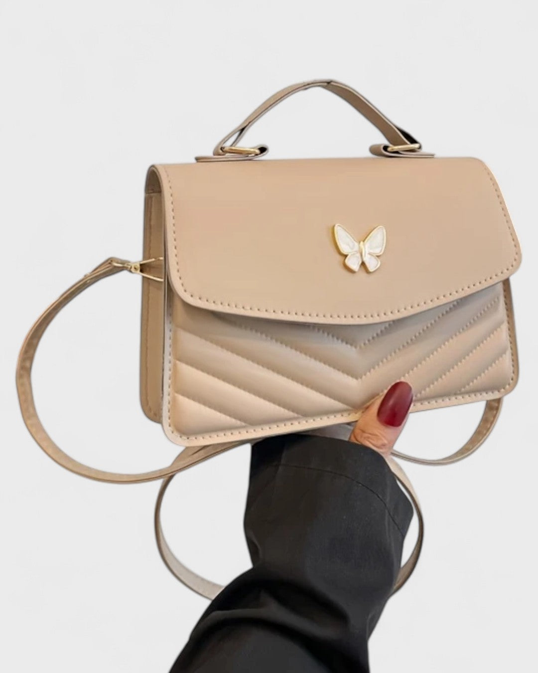 Sac à main papillon en simili cuir matelassé